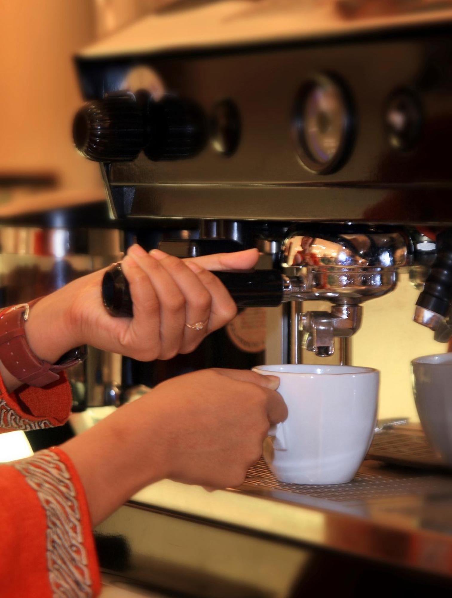 Melia Purosani Yogyakarta Hotel Exterior photo Espresso machine in action